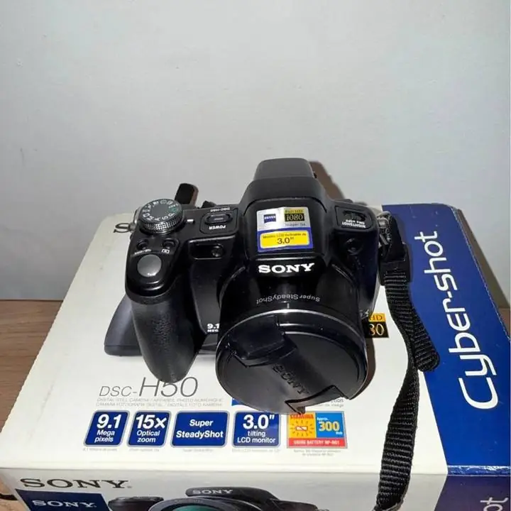 Cámara Sony + funda + caja