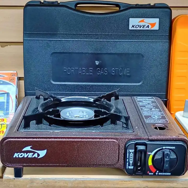 Cocina de camping más un pack de 4 unidades de gas butano KOVEA