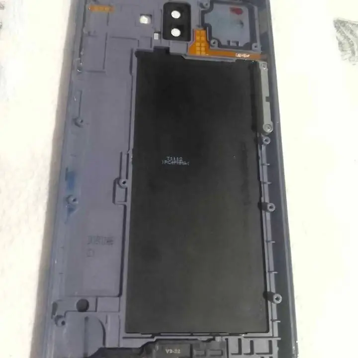 LG Q7 TAPA + HUELLA (detalle pintura) cubre camara