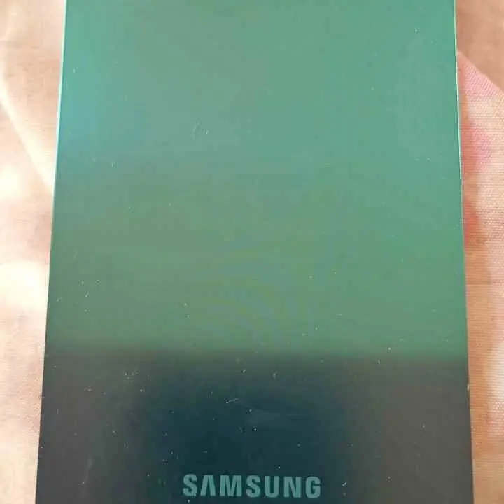 Samsung A07 tapa + cubre camara original sacada de equipo sin detalles (impecable)