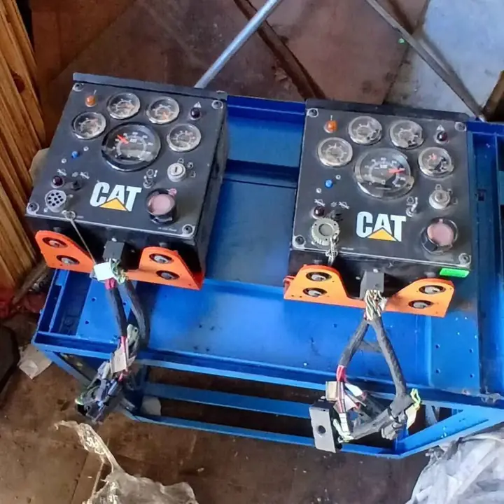 Paneles de instrumentos, de la estación de operador de maquinaria caterpillar