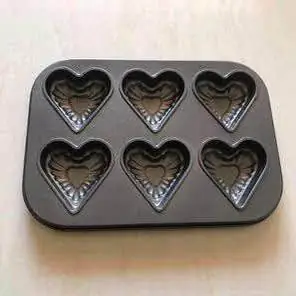 Porta cupcakes de Teflon x 12 unidades Modelo corazon
