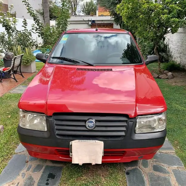 Fiat uno fire 1.2 8V 5 PUERTAS AIREmuy buen estado al día titular!