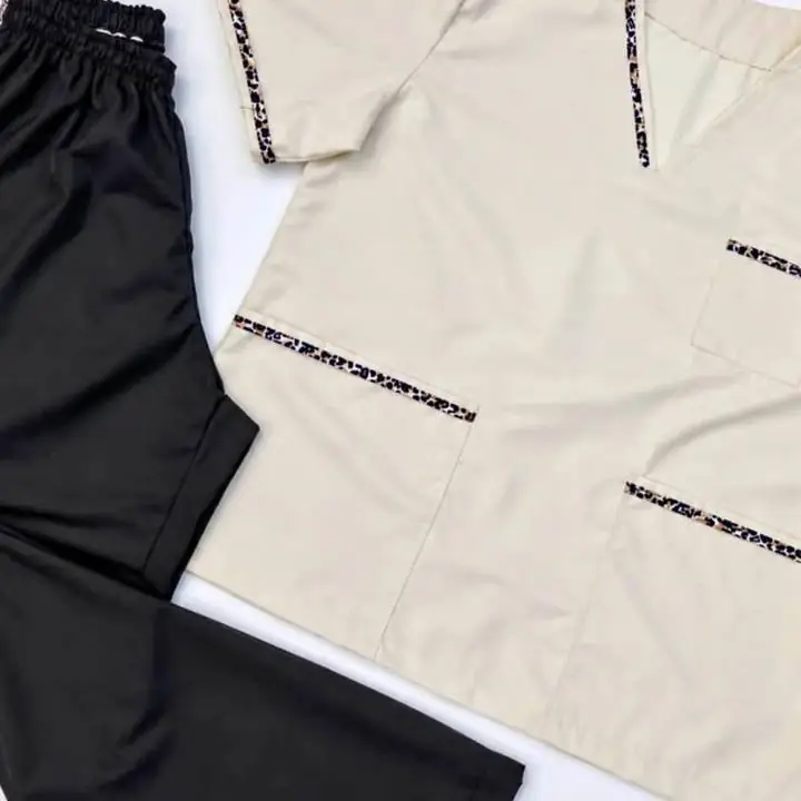 Ambo beige y negro con animal print talle xl