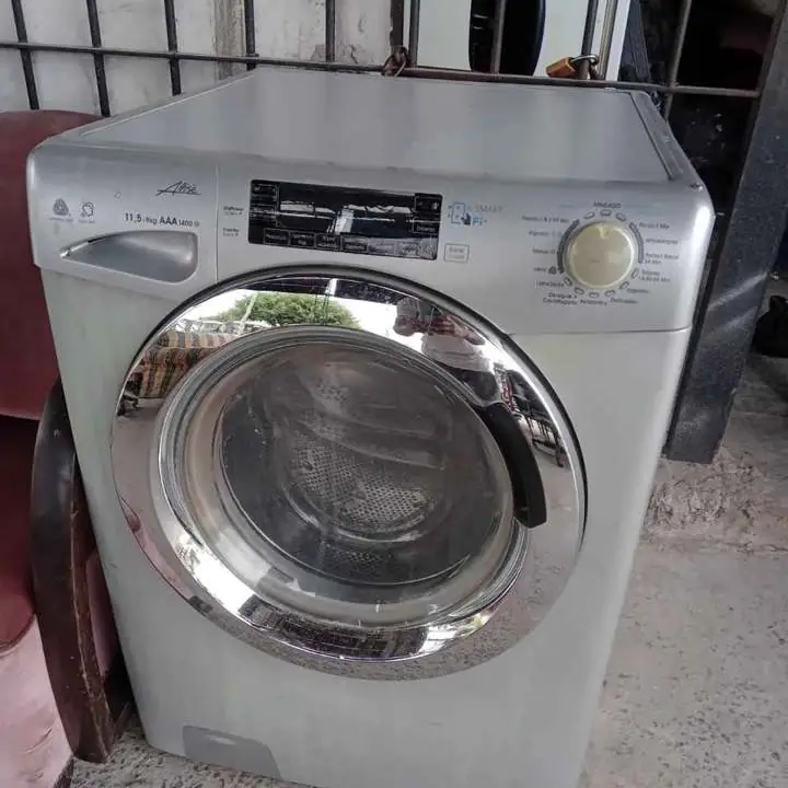 Lavarropas candy alise 11.5 kg 1.400 rpm funcionando detalles de uso muy buen estado