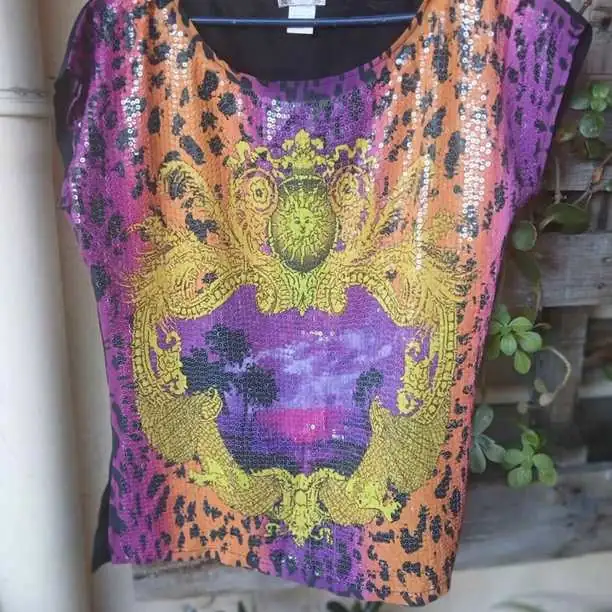 Remera de lentejuelas talle L liquido