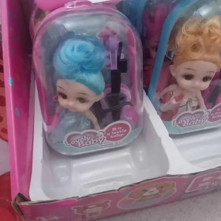 Mini muñeca valija y mas
