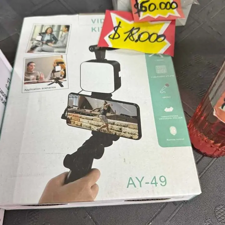 Trípode para celular con reflector