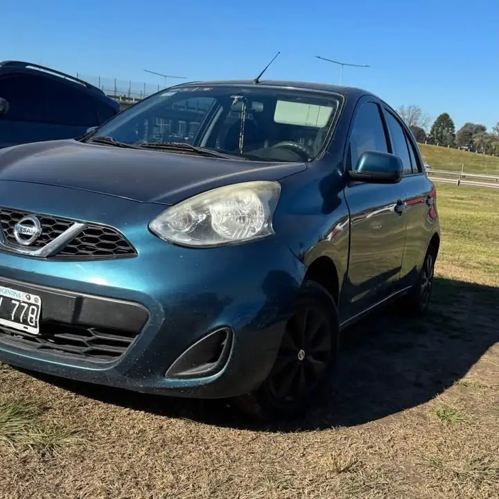 Nissan march km titular