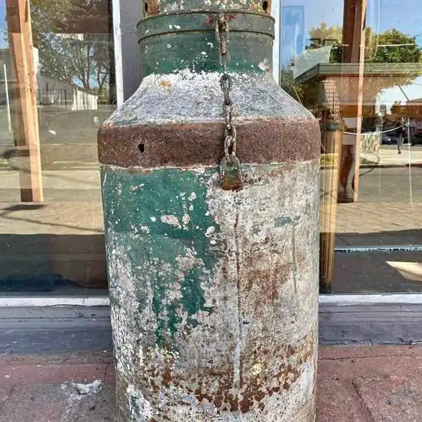 Tacho lechero antiguo decorativo valor $35,000