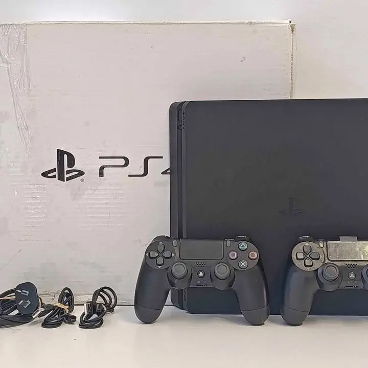 PlayStation 4 Slim 1tb + 2 controles + caja y cables