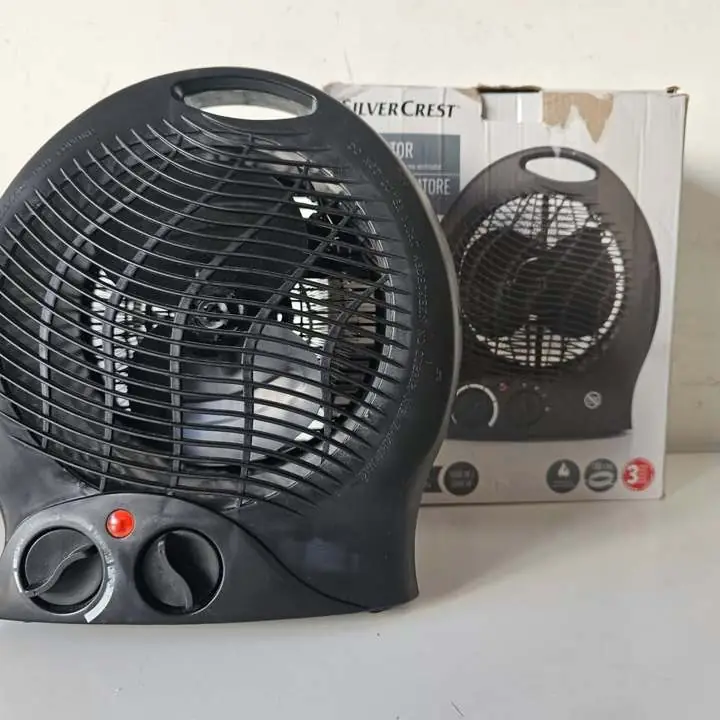 Calefactor silver crest negro más caja