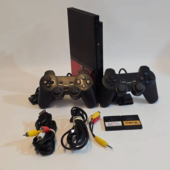 PlayStation 2 con 2 controles y memoria y juego