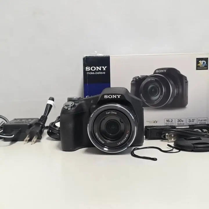 Sony camara dsc hx100v mas cargador y caja