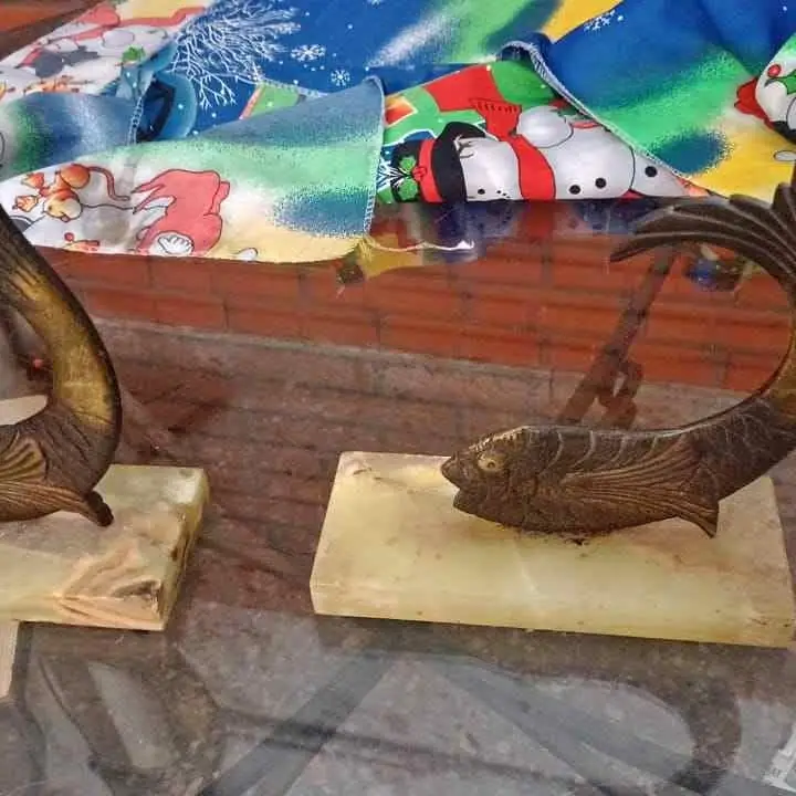 Adornos de peces de bronce antigüedad