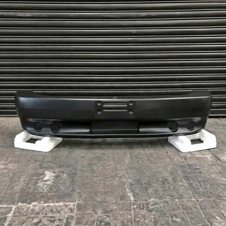 1114 Paragolpe envolvente (fibra) oferta