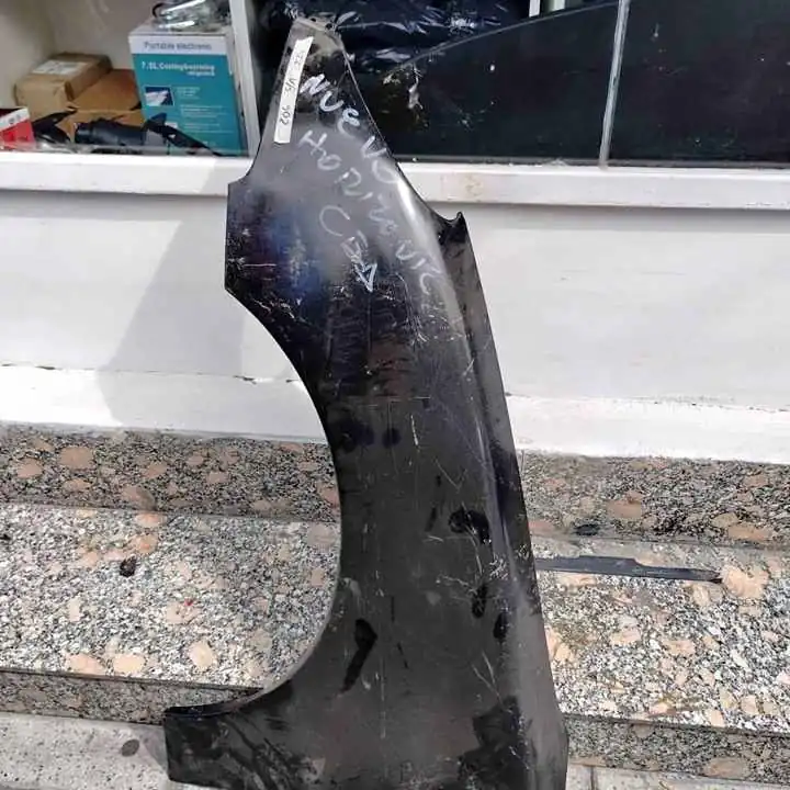 Guardabarro delantero 206