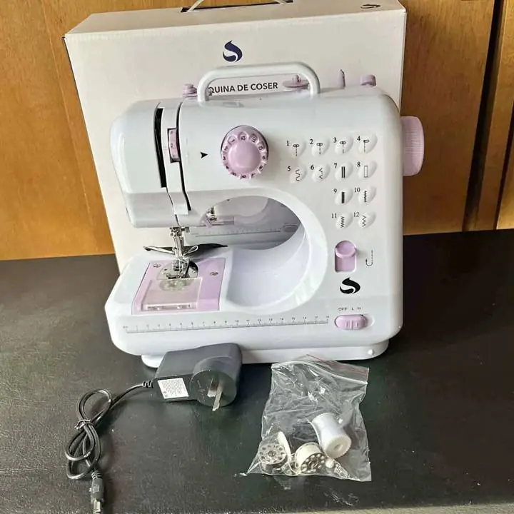 Maquina de coser dinax