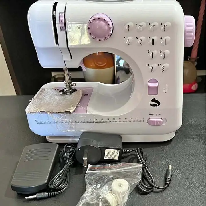 Máquina de coser souno portátil con luz
