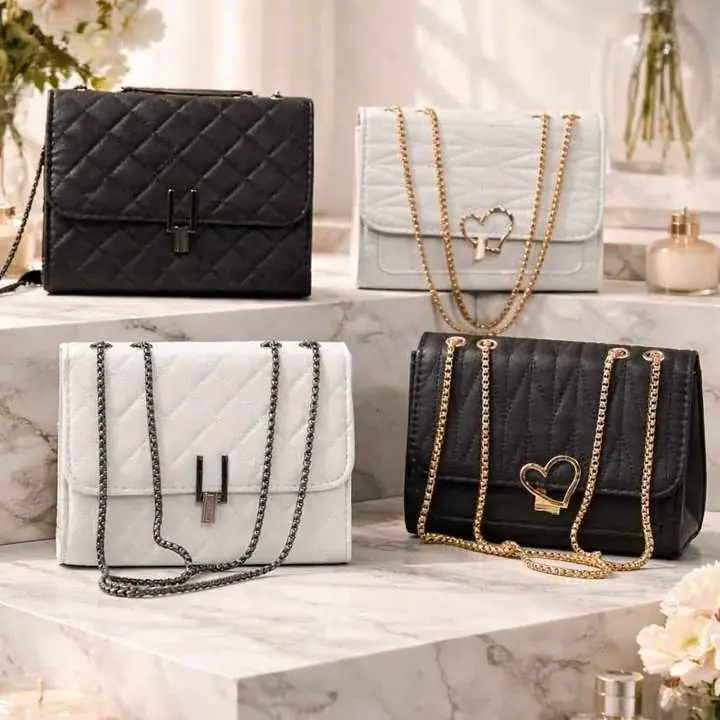 Carteras bandoleras broche corazón