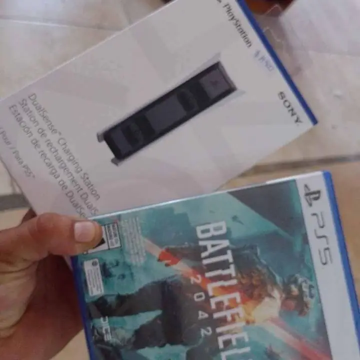 Combo juego + estación de carga ps5 nuevo