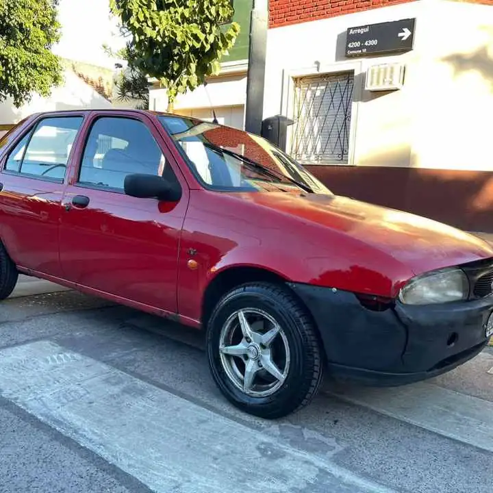 Ford fiesta 1998 todos los papeles listo para transferir excelente mecanica gasolero líquido$1.850