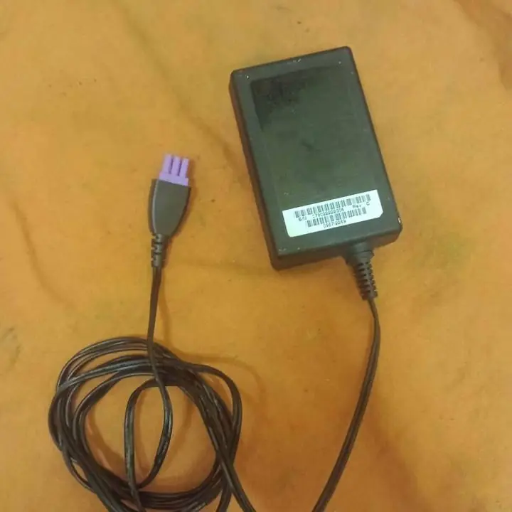 Vendo. Cargador de impresora HP. Ficha violeta