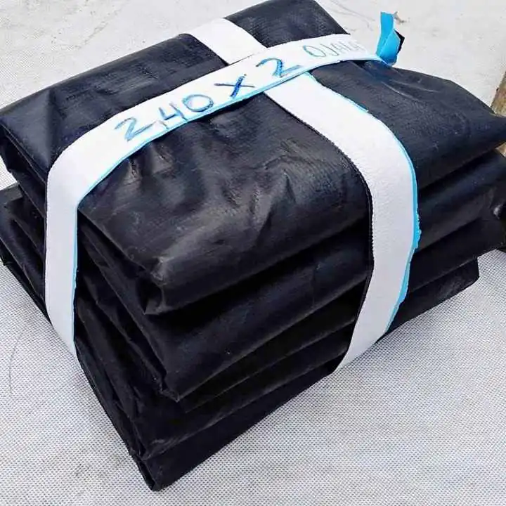 Se venden lonas gruesas y lisas nuevas sin uso con ojales colocados