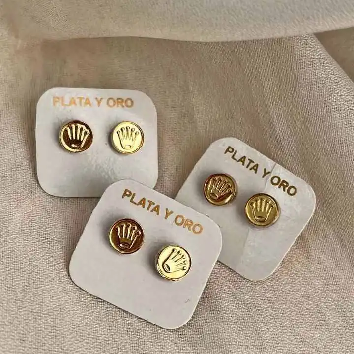 Aros corona rolex playa y oro