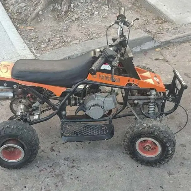 Cuatriciclo Yamaha de 50 c y moto Rouser 135