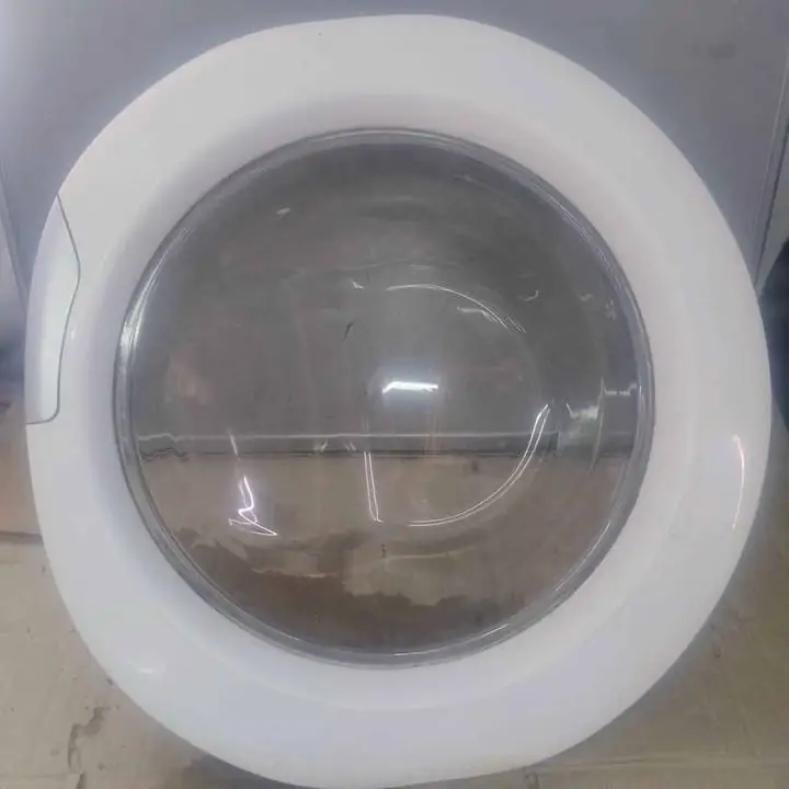 Puerta con visor de vidrio de lavarropas candy grand Evo