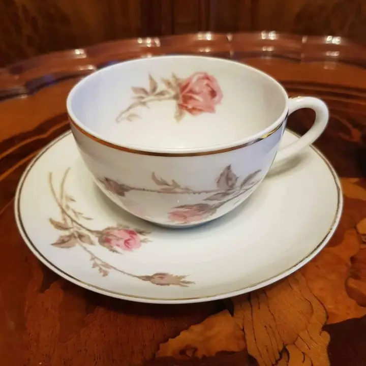 Par de duos de té Charles Ahrenfeldt rosas. Cod 581