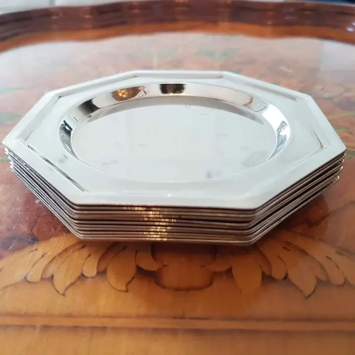 12 Posavasos octogonales silver plate. Cod.998