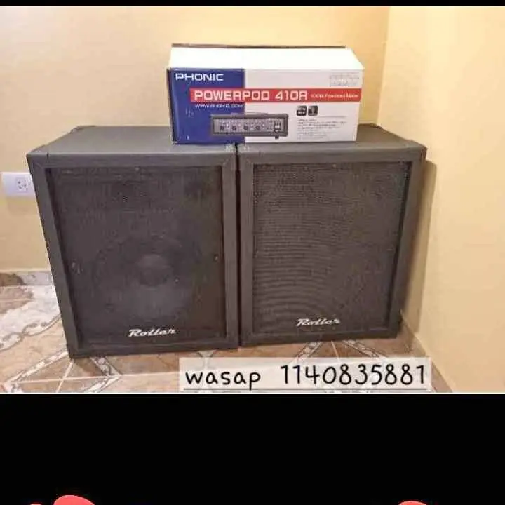 Consola potenciada Ponic.410 , 100 watts, mas bafles pasivos roller
