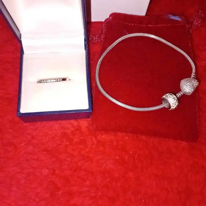 Conjunto de anillo de plata medio sin fin con pulcera de plata con dije