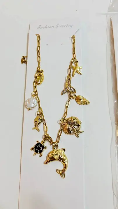 Collar acero con charms dorado