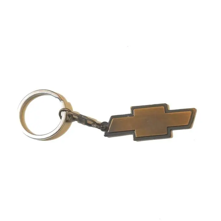 Llavero Chevrolet Kiara Dorado Metal Auto Camioneta Corsa Dorado Oscuro usado