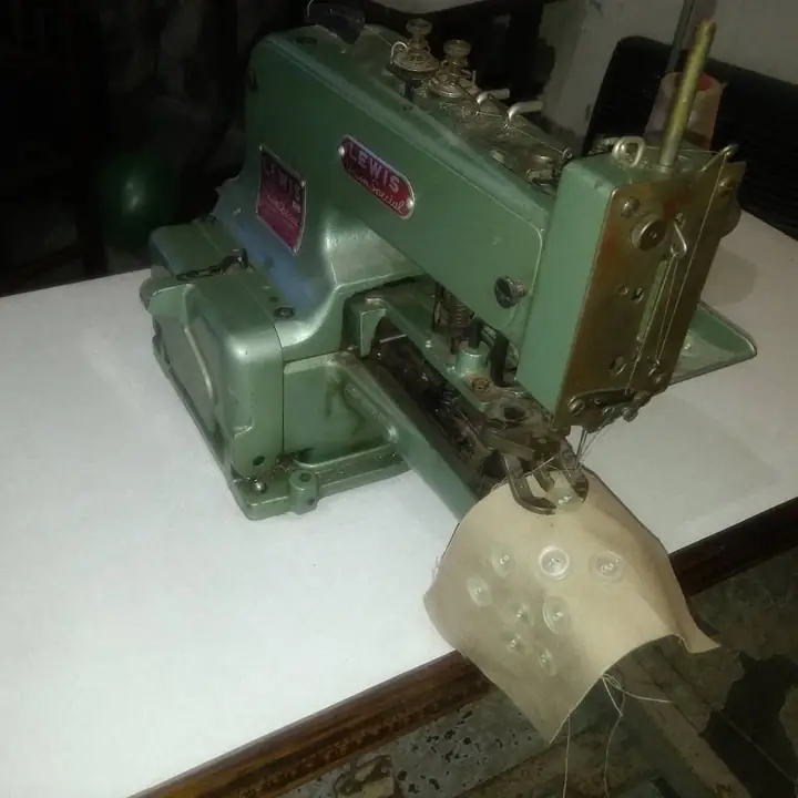 Maquina botonera lewis