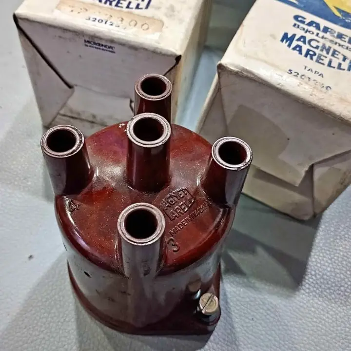 Fiat 128 europa - Iava europa - 125 tapa distribución Magneti Marelli italiana