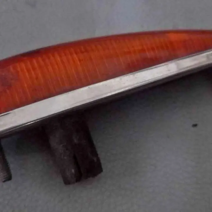 Fiat 1100 faro giro original FITAM