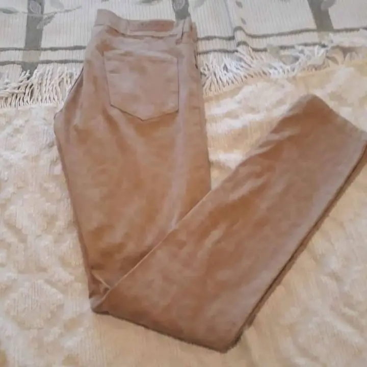 Vendo jean animal print beige talle 40