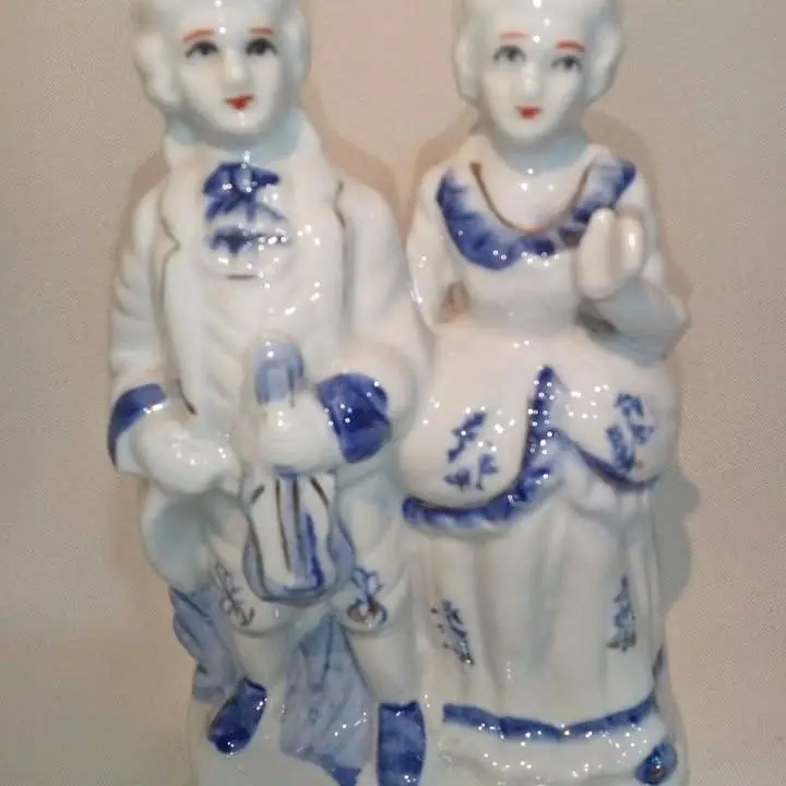 Dos parejas de musicos de ceramica esmaltda