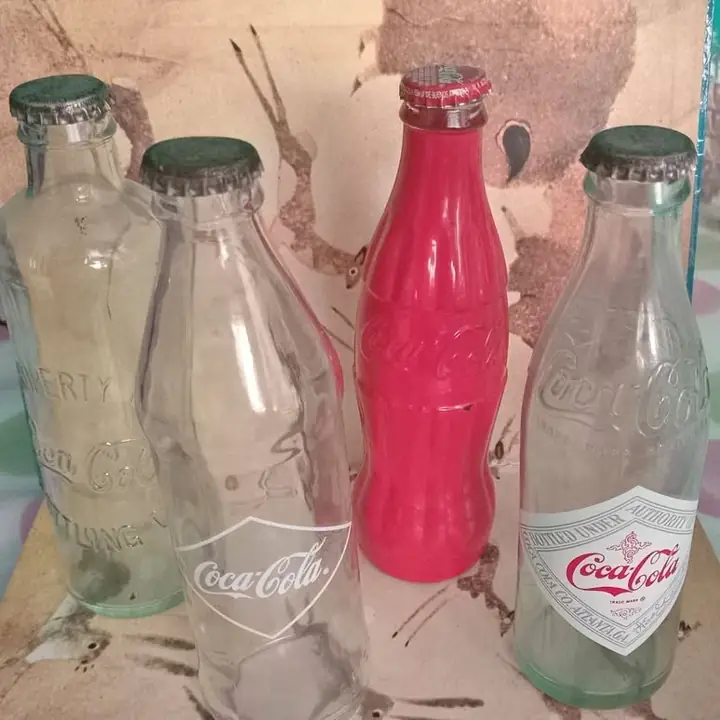 Lote de 9 botellas antiguas coca cola