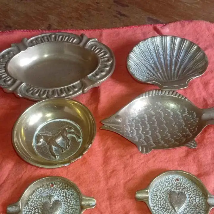 Remato lote cenizeros bronce y cubiertos. whatsap parque chacabuco