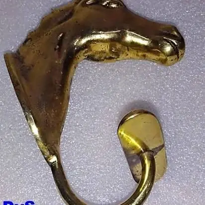 Antigua cabeza de caballo perchero en bronce macizo