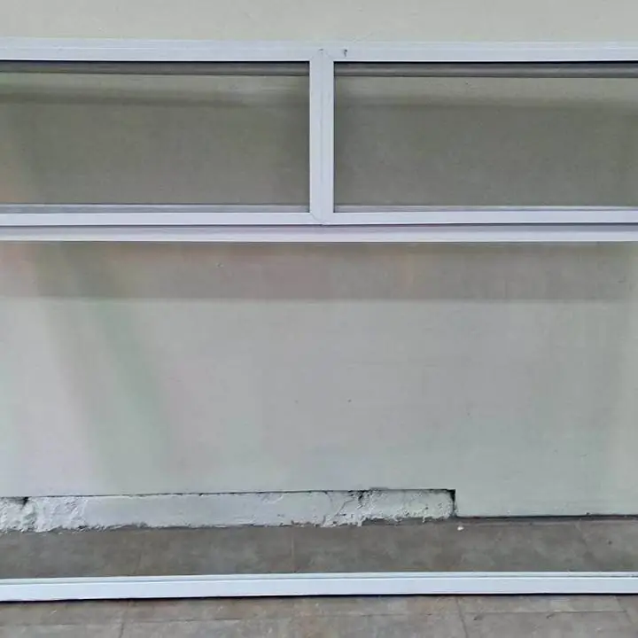 Ventana de aluminio paño fijo y banderola con mosquitero de aluminio blanco un metro 95 por 150