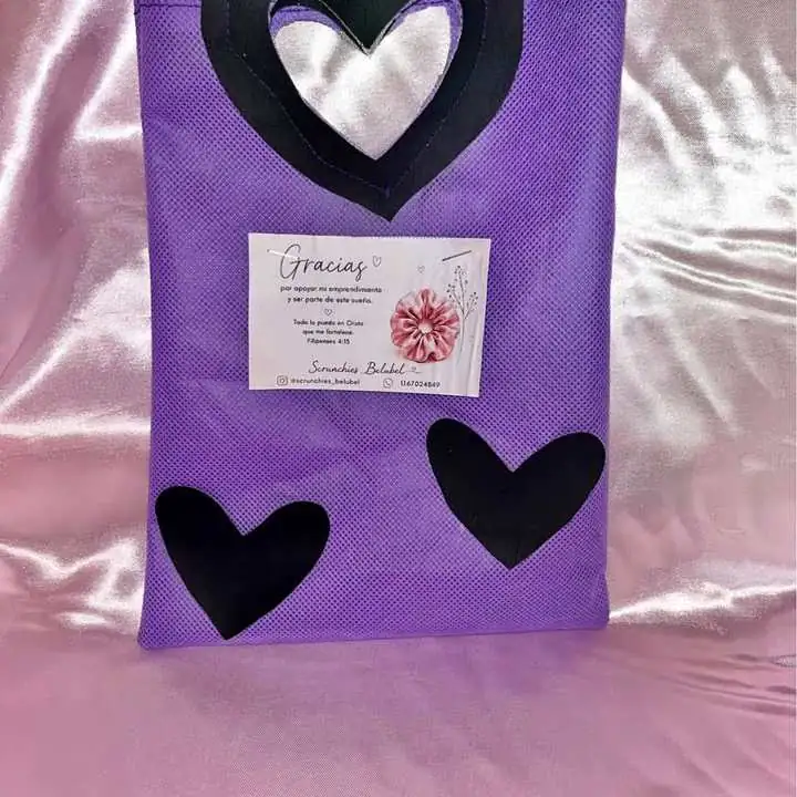 Bolsitas de friselina con manija corazón , también en PVC cristal