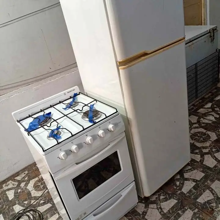 Combo heladera más cocina impecable!