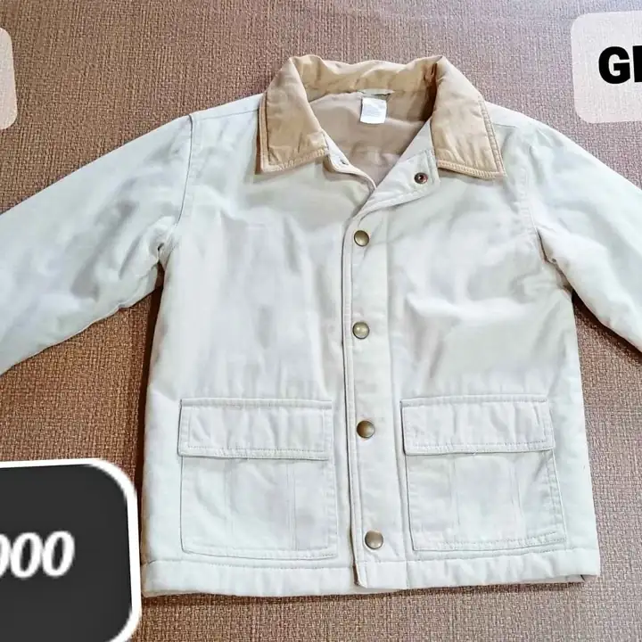 Campera cremita de niño talle.6