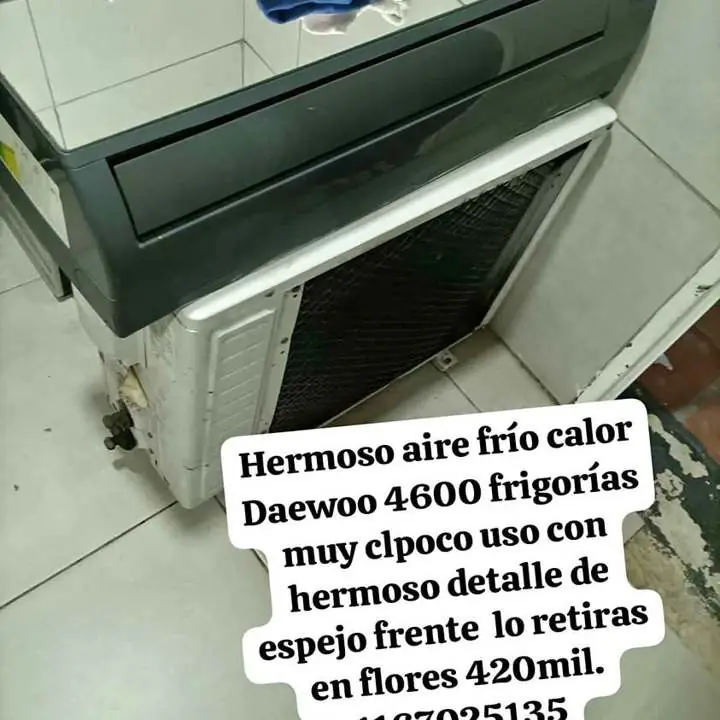 Hermoso aire frío calordaewo liquido impecable co. Detalle de espejo al frente se retira porflores